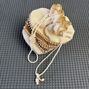 Beaded Woven  Drawstring Purse with Plastic Shell Shaped Bottom